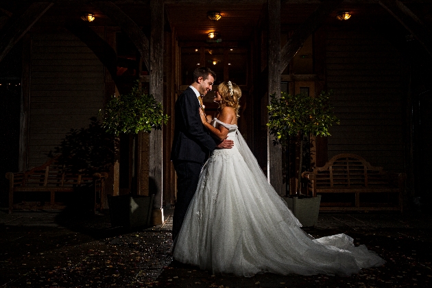 Sarah and Chris are backlit in a wedding photo by Catherine Luther Weddings
