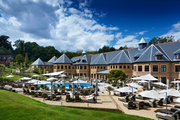 Outside pool and sunloungers at Pennyhill Park