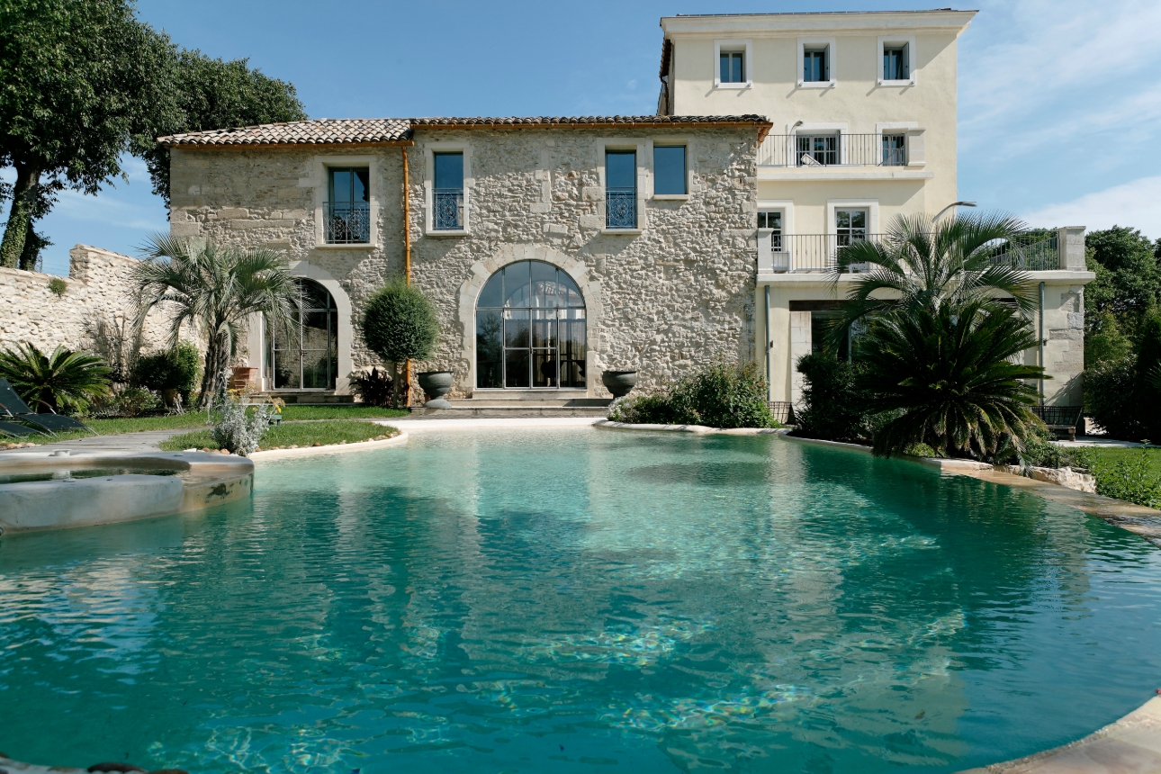 Outside shot of hotel with pool