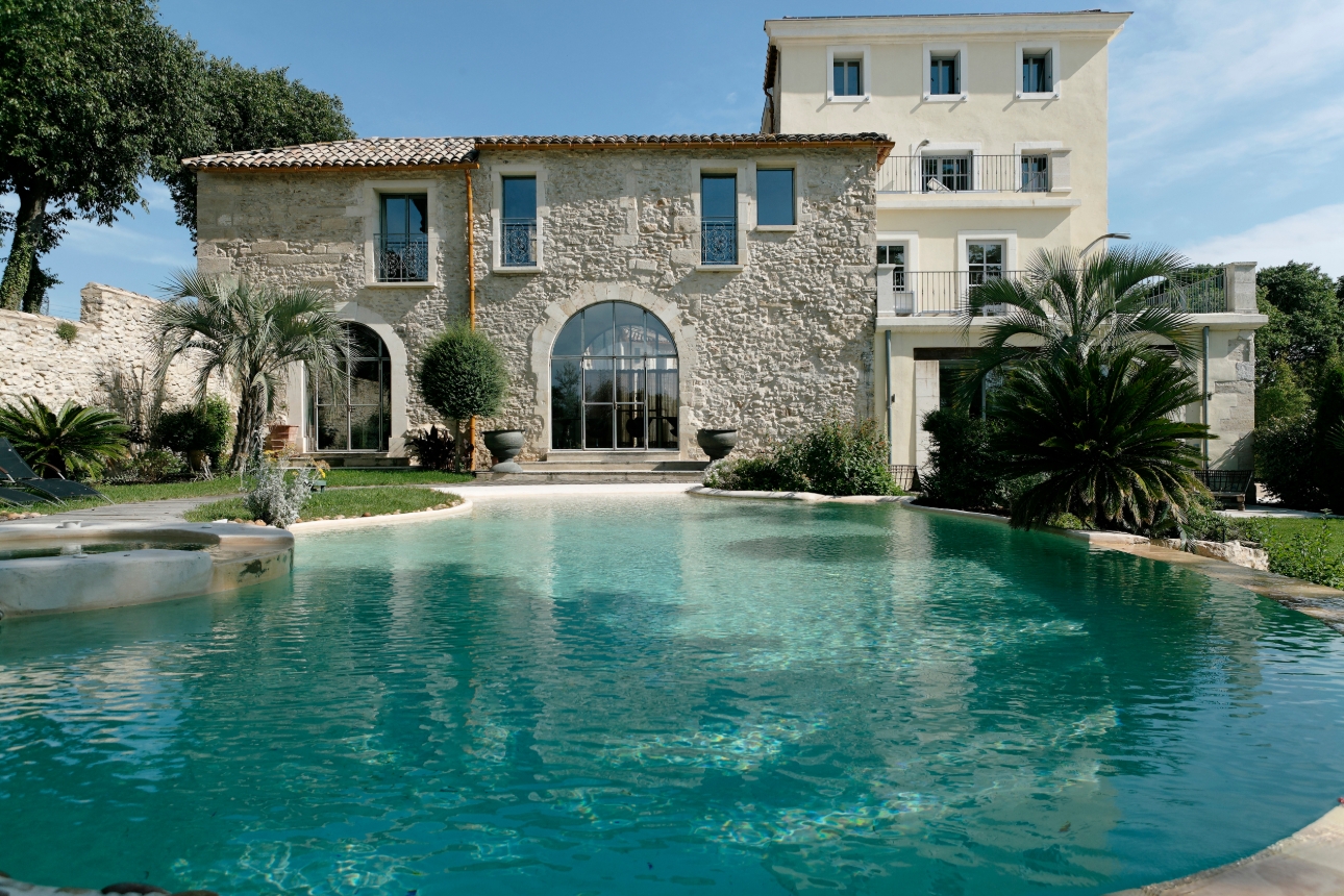 Outside shot of hotel with pool 