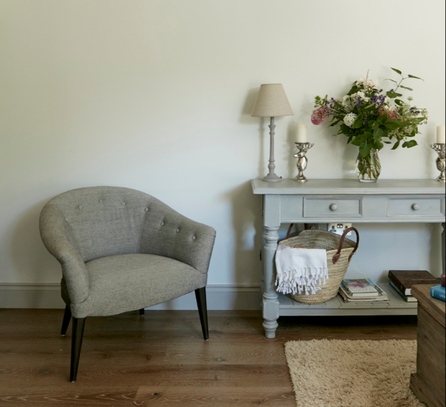 grey chair next to side table