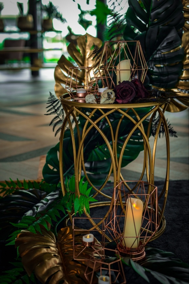 venue styling props including gold candle cages