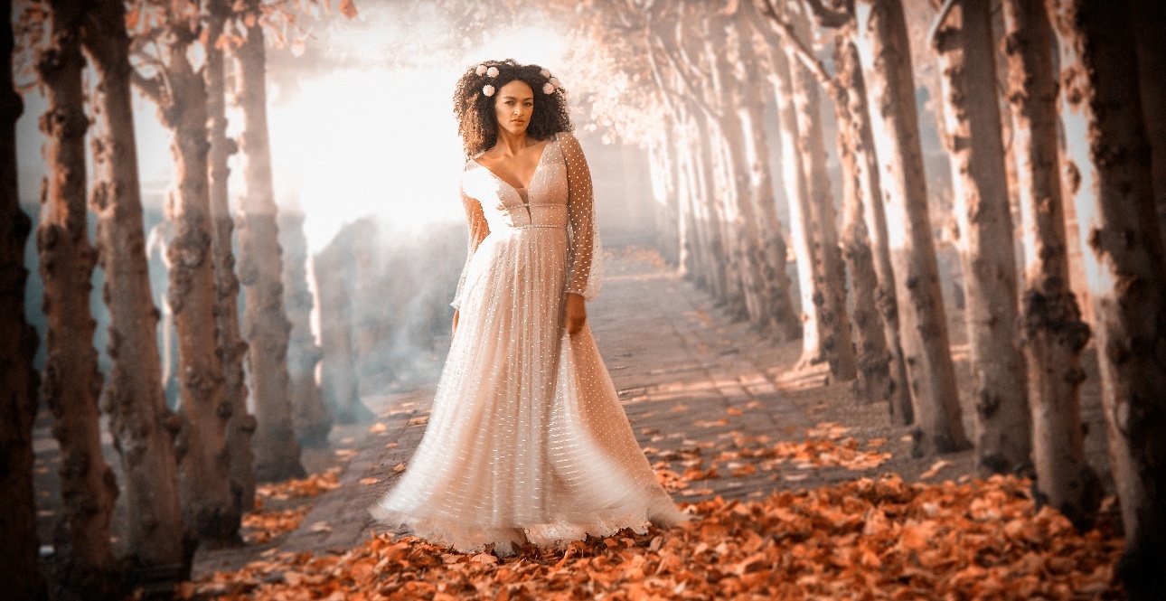 Autumnal shot of bride in the woods