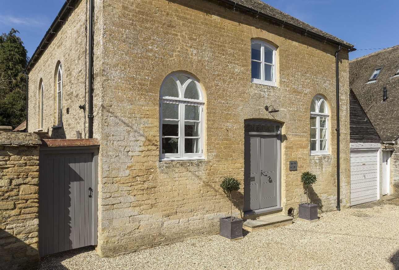 pale stone cottage gravel drive grey front door