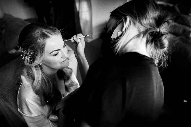 Black and white images of Leah doing a bride's makeup