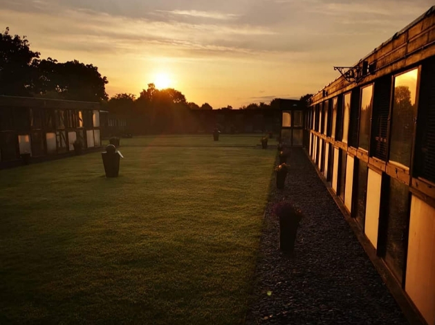 pets country manor at sunset