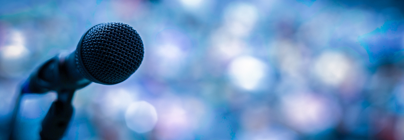 microphone with blue lights in the background