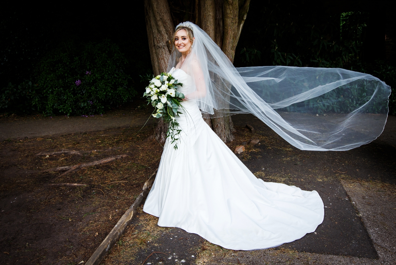 Bride's veil flows