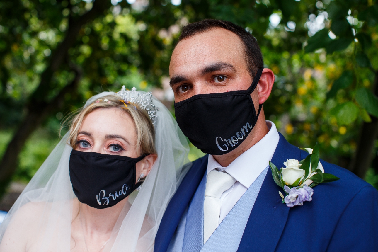 Bride and groom face masks