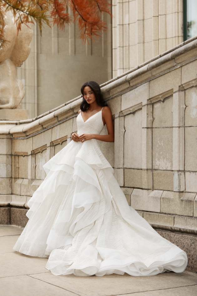 Model wearing tiered dress