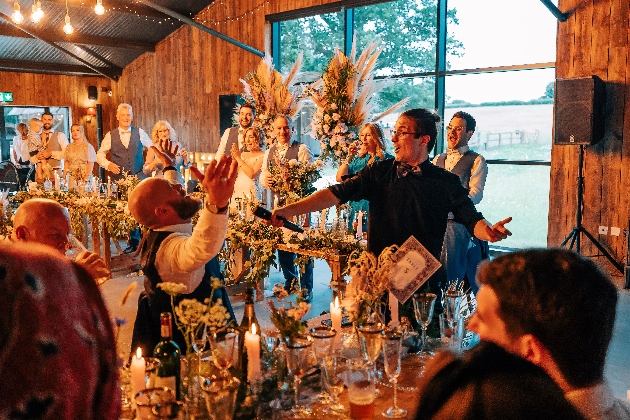 Singing waiters performing at a wedding