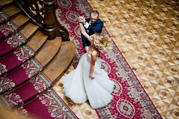 Married couple on grand staircase