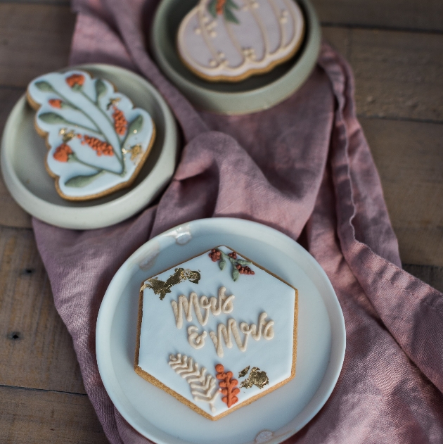 iced biscuits in a wedding design of flowers and pumpkin version