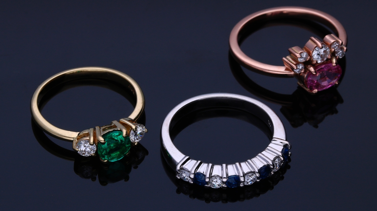 Coloured gemstone engagement rings from high street jeweller Ernest Jones
