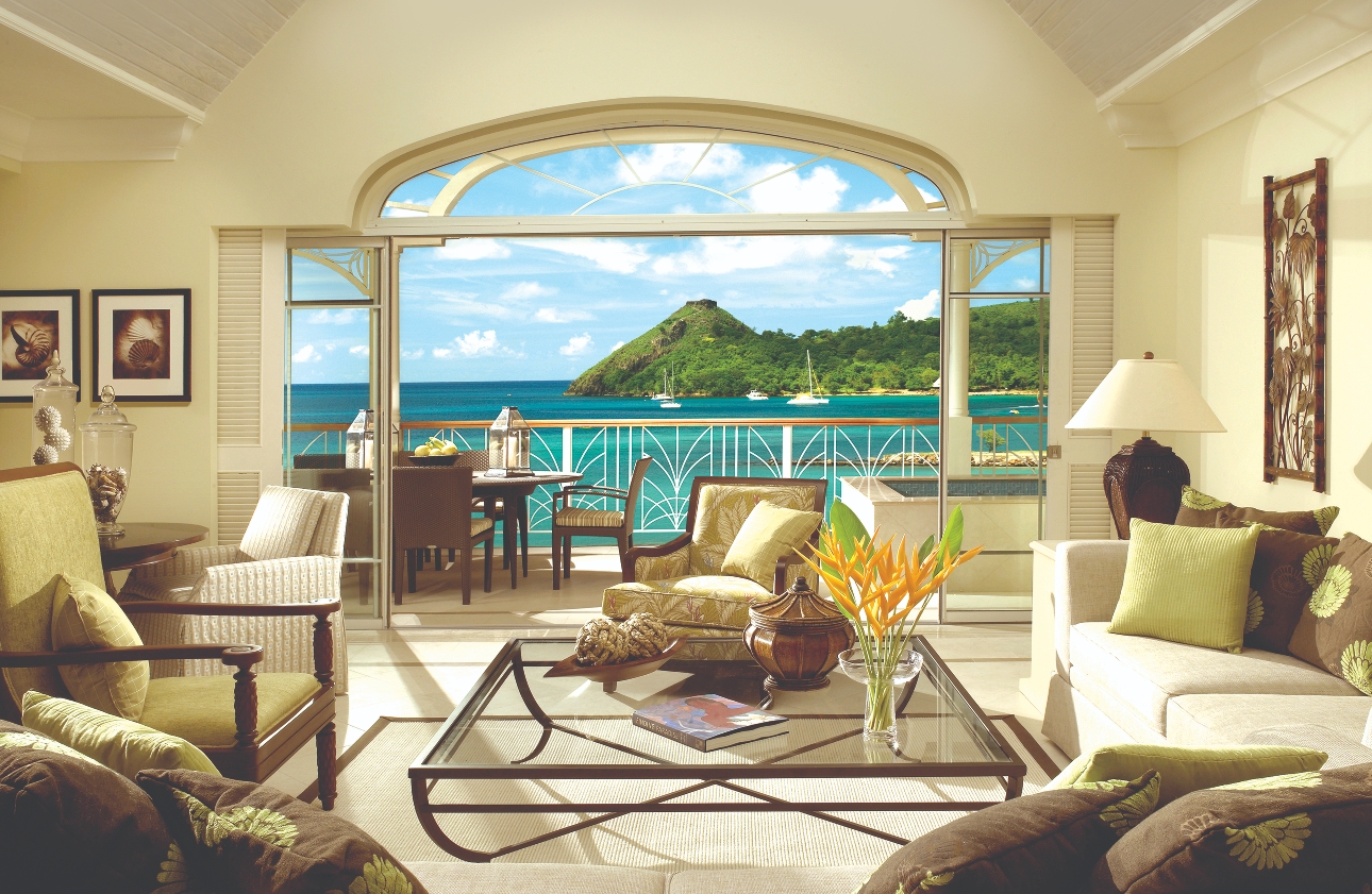 The Landings Resort sitting room in suite with balcony and views of the sea and mountains 