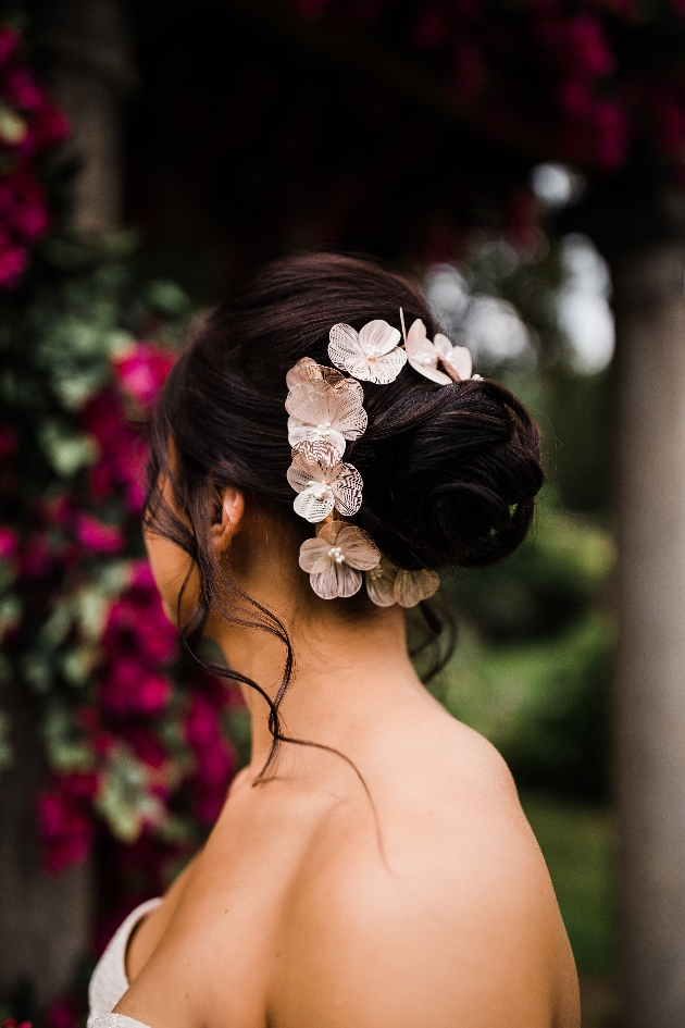 Bridal bun with floral accessory