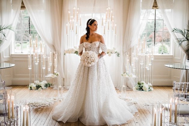 white wedding setup at Eaves hall with bride in glittery dress
