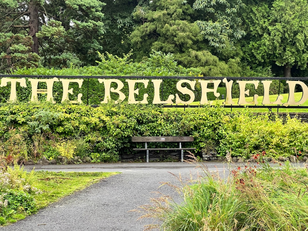 hotel sign in the bushes