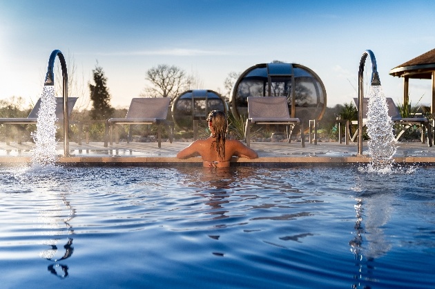 Woman with her back to the camera in a swimming pool