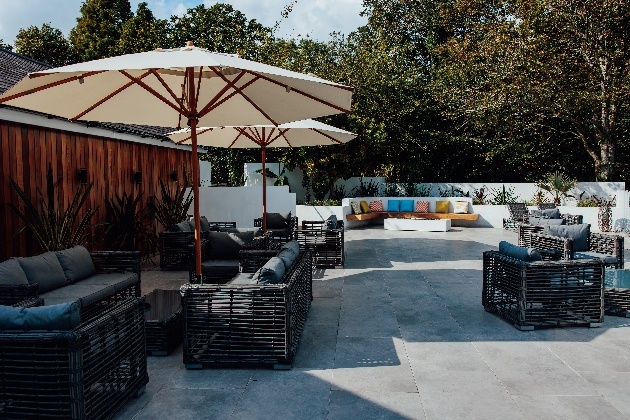 Talhenbont Hall's outdoor terrace with seating