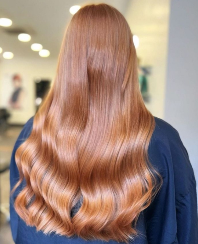 Peach coloured long hair seen from the back