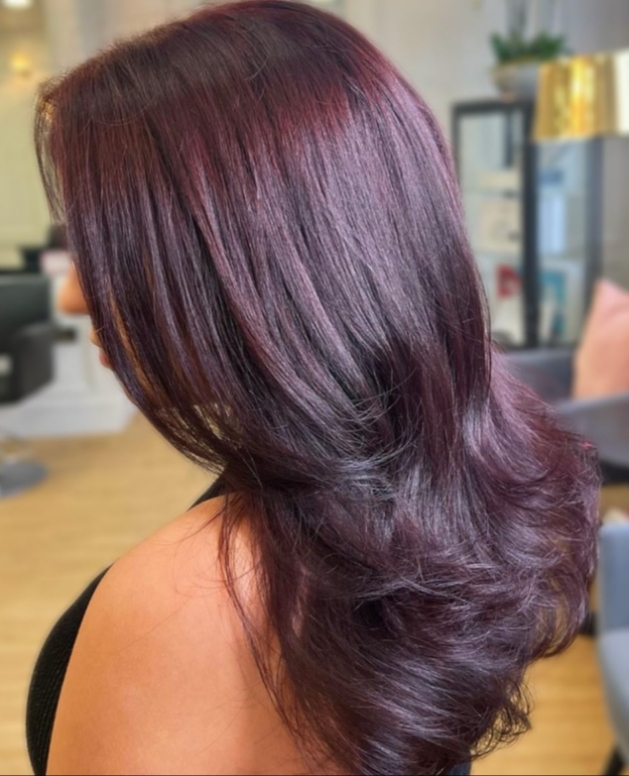 Dusky purple hair cherry cola seen from the side