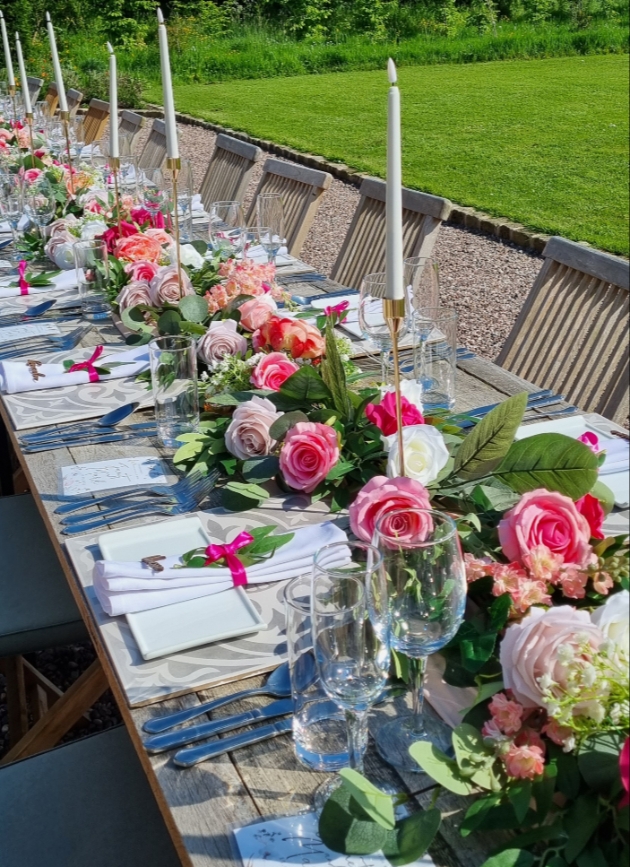 Table centre floral runner outside viva magenta and pink