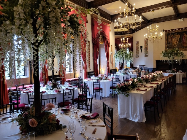 maximalist wedding reception white wisteria trees