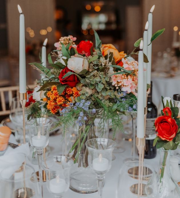 Rust wedding colour palette table centre flowers