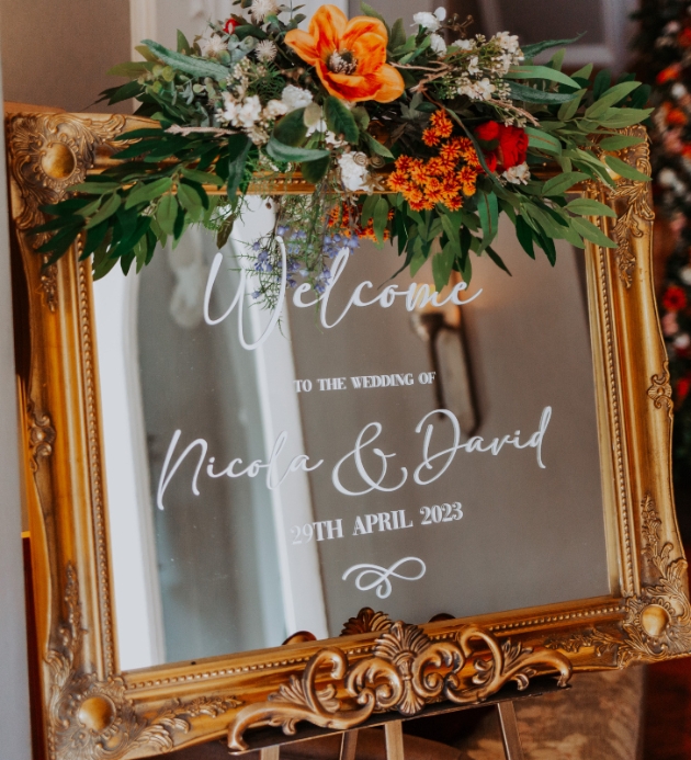 Rust wedding colour palette welcome sign mirror floral decor