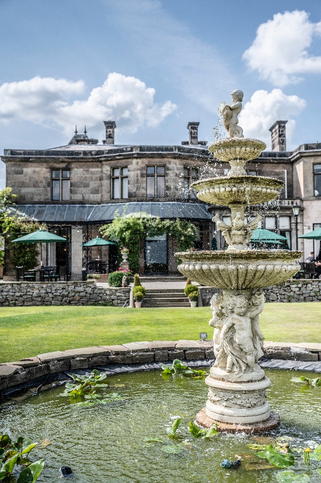 View of Rookery Hall with fountain in the foreground