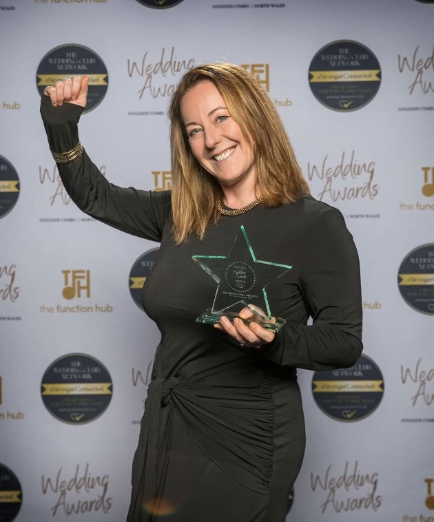 Alicia Cox from Talhenbont Hall celebrating award win.