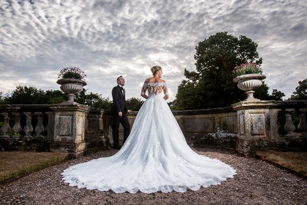 bride facing away from the camera stormy conditions