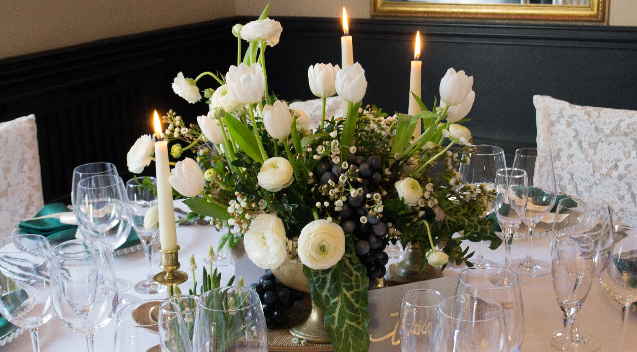 Wedding tablescape featuring black grapes