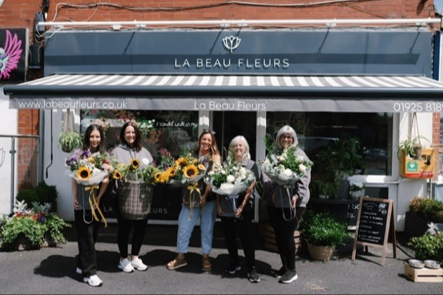 Warrington's La Beau Fleurs team outside the shop
