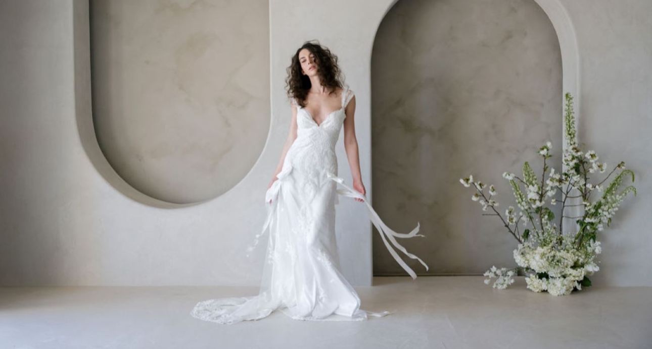 white wedding dress with applique and tassles