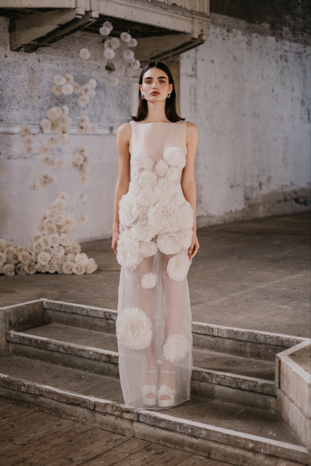 a dreamy gown created from silk organza with hand-embroidered ruffles